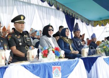 Tatong Hadiri Upacara HUT Ke-15 Kabupaten Boltim