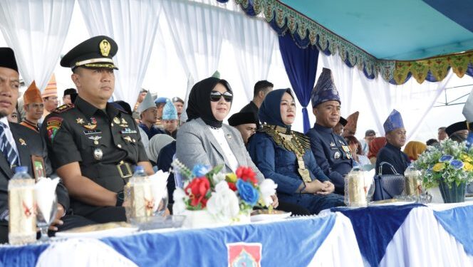 Tatong Hadiri Upacara HUT Ke-15 Kabupaten Boltim