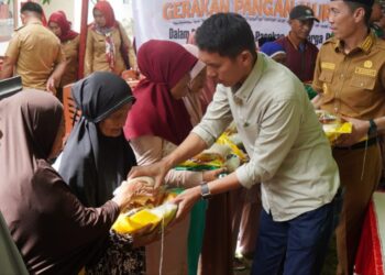 Ketua Komisi II DPRD Bolsel Hadiri Gerakan Pangan Murah di Posigadan