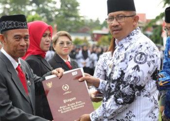 Pj Wali Kota Kotamobagu Pimpin Upacara Memperingati Hari Guru Nasional dan HUT ke-78 PGRI juga HUT ke-52 KORPRI