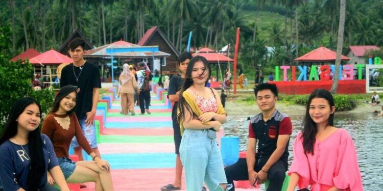 Wisata Pantai Tersakiti Desa Pinolantungan, Paling Populer di Bolsel 2024