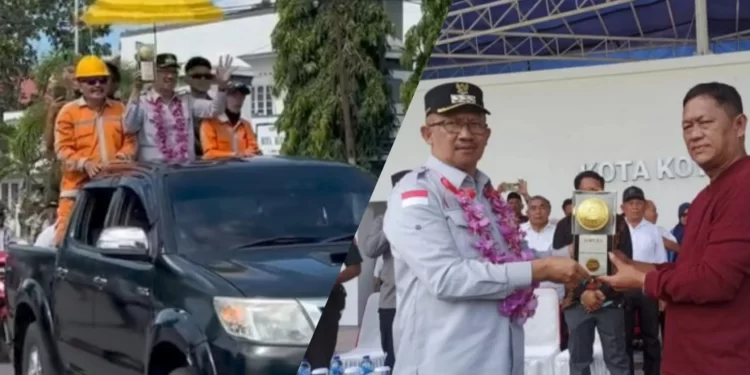 Bersama Petugas Kebersihan, Pj Wali Kota Kotamobagu Pimpin Arak-arakan Piala Adipura ke-10