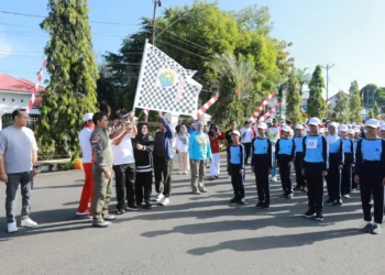 Pj Wali Kota Kotamobagu Lepas Ribuan Peserta Lomba Gerak Jalan Peringati HUT Kotamobagu ke-17 Tahun