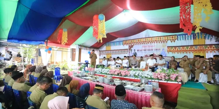 Pj Wali Kota Kotamobagu Hadiri Halal Bihalal di Desa Pintodon Timur