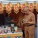 Selain Meninjau, Pj Wali Kota Kotamobagu Juga Berbelanja di Lokasi Stand Pameran UMKM di Kegiatan MTQ ke-30