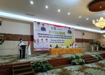 Pj Bupati dr Jusnan Mokoginta Berikan Arahan pada Sosialisasi Pendampingan Hukum Bagi Kepala Desa di Bolmong