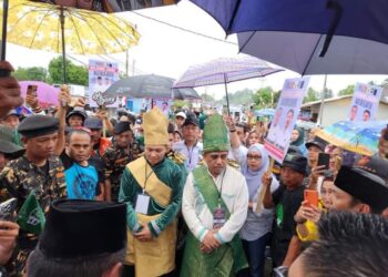 Resmi Mendaftar di KPU Bolmong, Ribuan Pendukung Yusra-Donny Bikin Macet Lolak