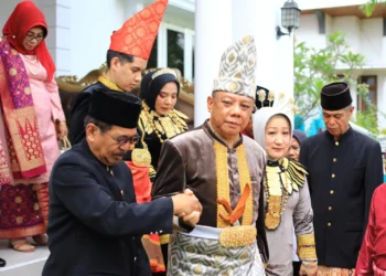 Pj Wali Kota Kotamobagu Abdullah Mokoginta Dijemput Degan Adat Poponikan Kon Komalig Moloben