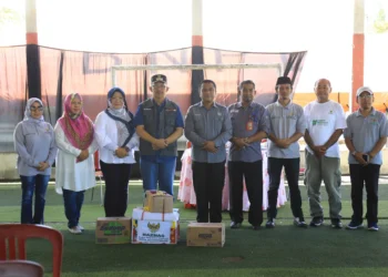 Pj Wali Kota dan Rombongan SKPD Kotamobagu Serahkan Bantuan Logistik Bagi Warga Bolsel yang Terdampak Bencana