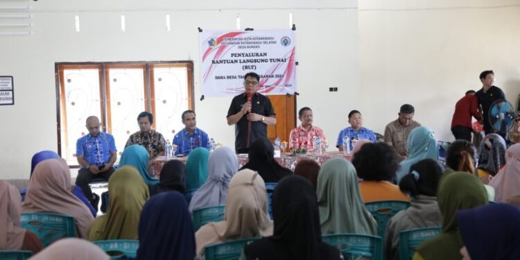 Pj Wali Kota Kotamobagu Hadiri Operasi Pasar Murah di Desa Bungko