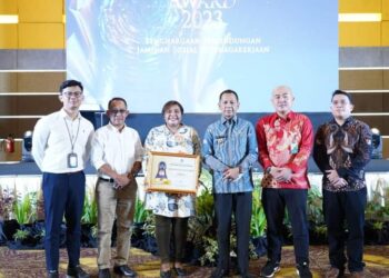 Pj Bupati Bolmong Hadiri Acara Penghargaan Paritrana Awards