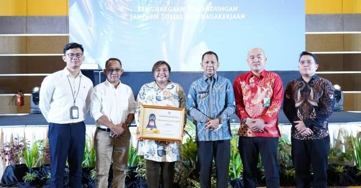 Pj Bupati Bolmong Hadiri Acara Penghargaan Paritrana Awards