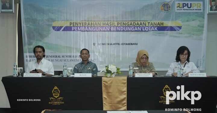 Pj Bupati Bolmong Hadiri Penyerahan Pengadaan Tanah di Bendungan Lolak