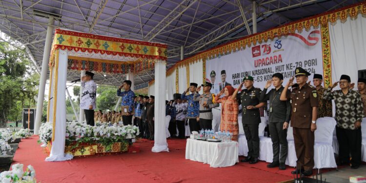 Pj Wali Kota Kotamobagu Pimpin Upacara Peringatan HGN, HUT PGRI, dan HUT KORPRI Tahun 2024
